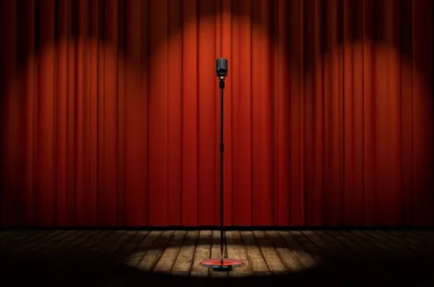 depositphotos_50204239-stock-photo-microphone-on-stage-with-red