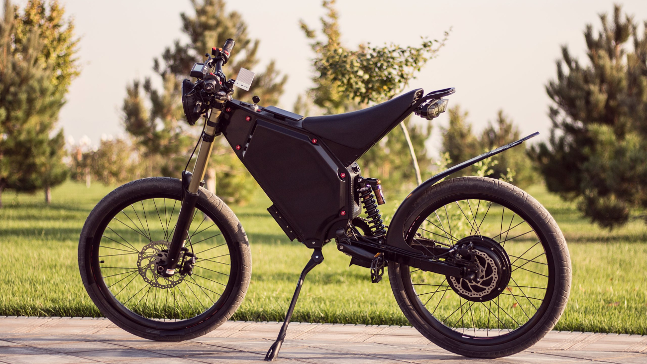 Electric bike battery motor wheel with pedal and rear shock absorber. Ebike bicycle environmentally friendly eco e-mountainbike transport. Healthy lifestyle