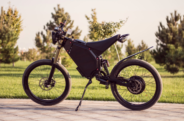 Electric bike battery motor wheel with pedal and rear shock absorber. Ebike bicycle environmentally friendly eco e-mountainbike transport. Healthy lifestyle