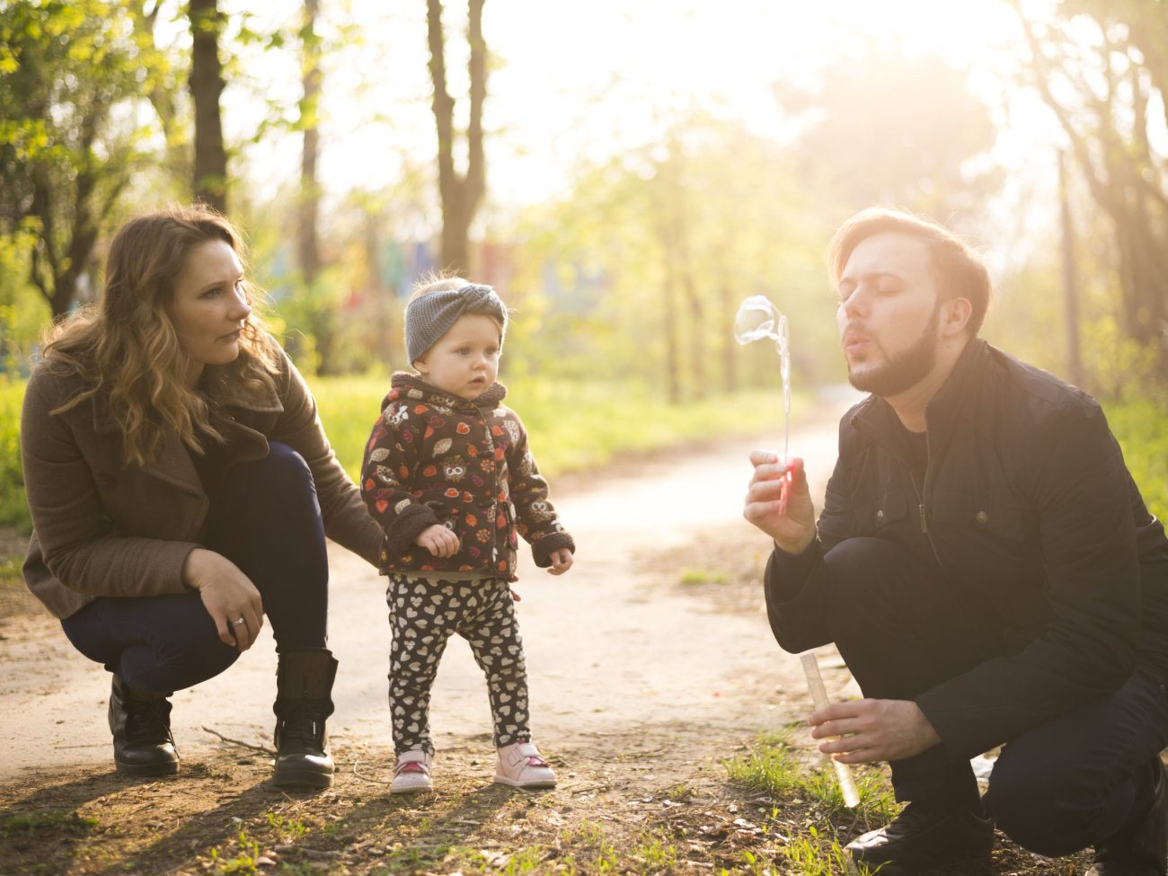 happy-parents-with-child-nature