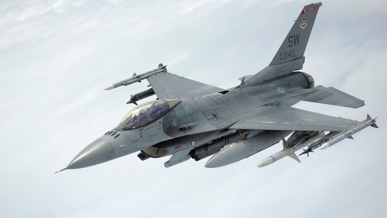 An_F_16_Fighting_Falcon_departs_after_being_refueled_by_a_KC_135