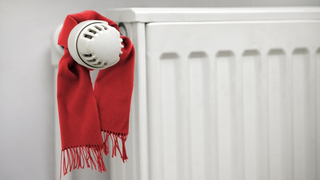 conceptual_winter_classic_scarf_thermostat_energy_saving_house_min