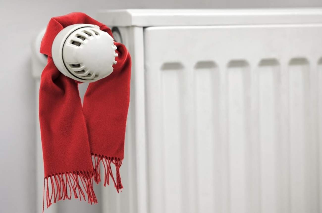 conceptual_winter_classic_scarf_thermostat_energy_saving_house_min
