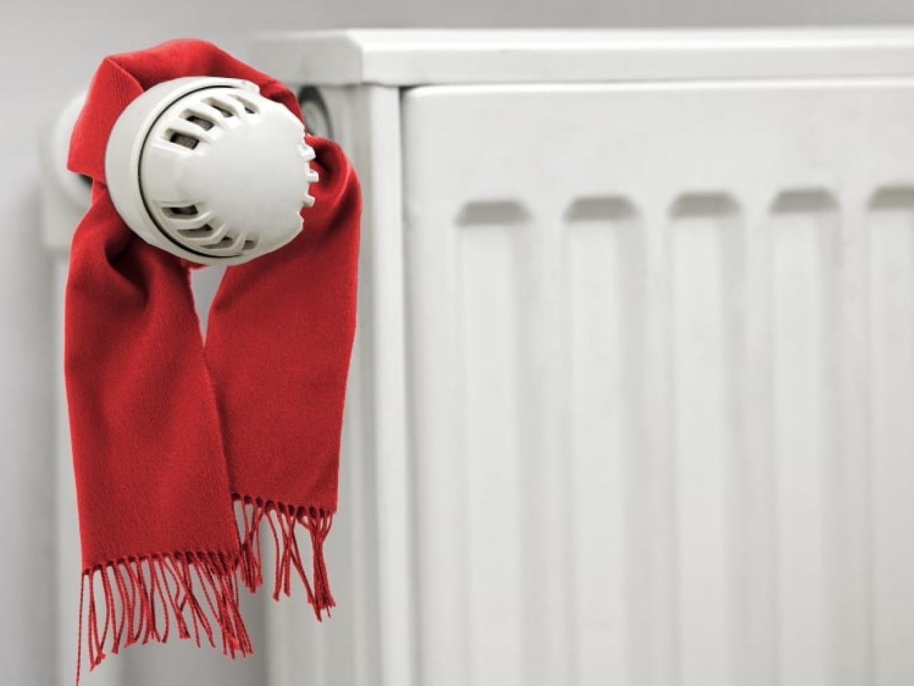 conceptual_winter_classic_scarf_thermostat_energy_saving_house_min