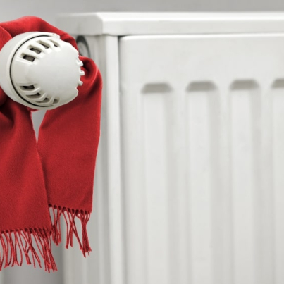 conceptual_winter_classic_scarf_thermostat_energy_saving_house_min