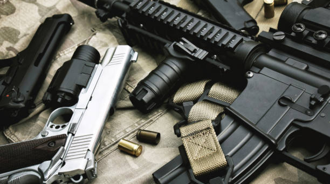 Weapons and military equipment for army, Assault rifle gun (M4A1) and pistol on camouflage background.